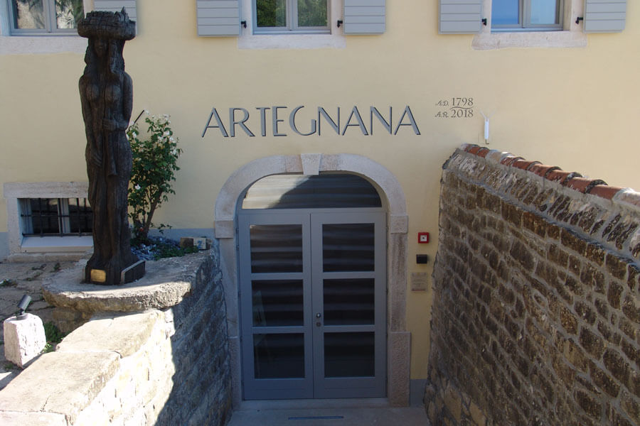 Artegnana main entrance with arched doorway and A.D. 1798 inscription